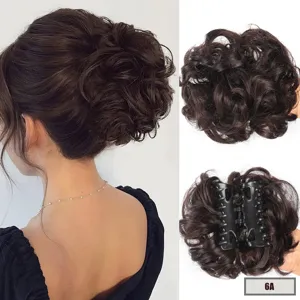 Close-up detail of messy curly hair bun extension with secure claw clip for easy styling.