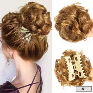Detail view of synthetic curly hair claw clip bun, showing fluffy messy updo texture and clip.