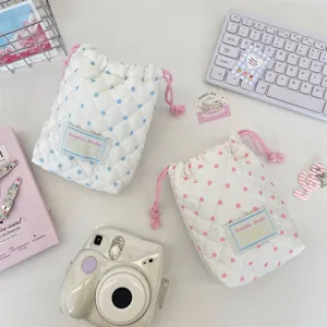 Quilted polka dot drawstring storage bag for camera, jewelry and small items, cute design.