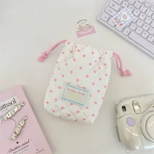 White quilted polka dot drawstring pouch for small items, cute desktop storage bag.