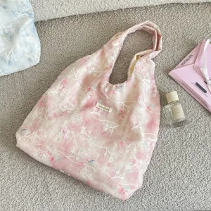 Pink tie-dye canvas hobo shoulder bag with white 3D floral embroidery, casual aesthetic tote.