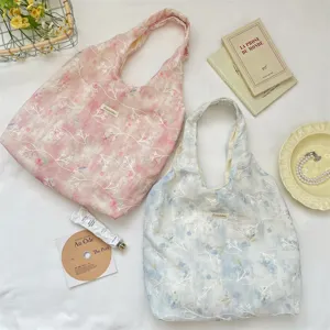 Ins soft tie-dye canvas shoulder bag with 3D floral embroidery and aesthetic design.