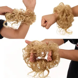 Detailed close-up showing the fluffy texture and messy style of the blonde synthetic hair bun scrunchie.