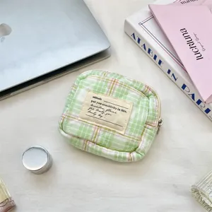 Petite pochette matelassée à carreaux verts, mini trousse de maquillage et organiseur de bureau.