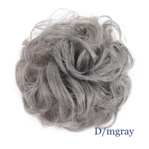 Synthetic messy hair bun scrunchie in medium grey, fluffy updo hair piece for women.