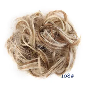 Synthetic hair bun extension detail shot showing the messy curly texture and 108# color shade.