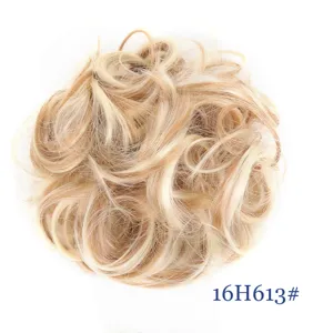 Synthetic hair bun detail shot showing fluffy messy texture and 16H613# blonde color blend.