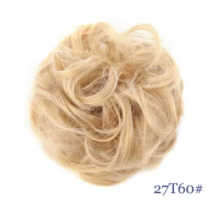 Detailed view of the messy synthetic hair bun scrunchie showing soft texture and blonde color.