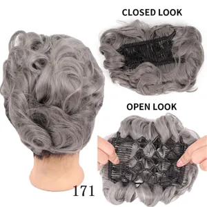 Detailed view of the grey synthetic hair bun showing inner comb structure and easy clip-on design.