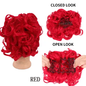 Close up details of red synthetic hair bun extension, showing open and closed hair claw clip.