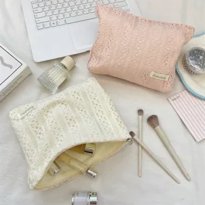 Rosa hohle Spitzen Kosmetiktasche im koreanischen Stil, niedliche Reisetasche fuer taeglichen Gebrauch.