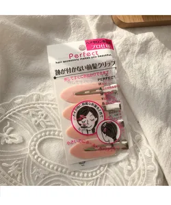 Set mit 4 rosa nahtlosen Haarspangen in professioneller Verpackung für Make-up
