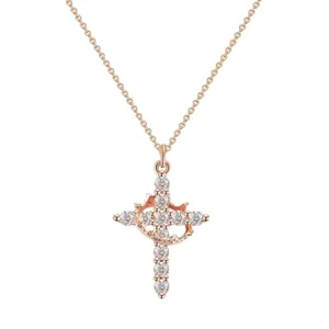 Close-up of a rose gold rotatable cross pendant with crown detail and sparkling stones