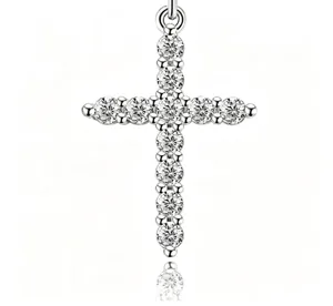 Close-up detail of a silver cross pendant encrusted with sparkling pavé cz stones