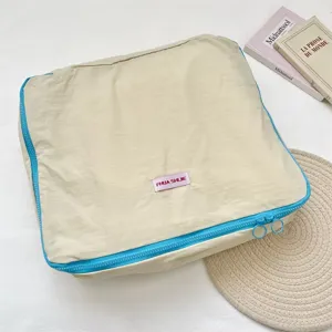 Koreanischer Stil kontrastfarbener Rand Kleideraufbewahrungstasche Reise-Packwürfel Koffer