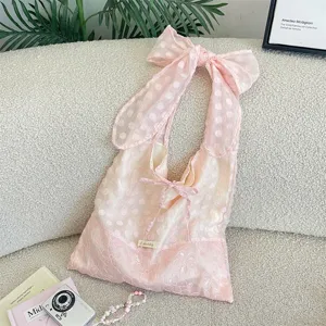 Pink organza bow tote bag detailed view, aesthetic lace shoulder bag for women and girls.