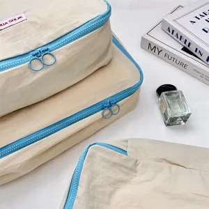 Koreanischer Stil Kontrast Paspelierung Reise Kleidung Aufbewahrung Beutel Detail Packtasche Koffer.