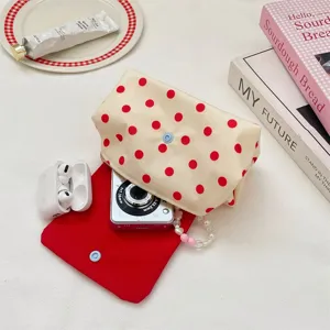 Polka dot contrast color flap makeup pouch portable cosmetic storage bag with cute red dots.