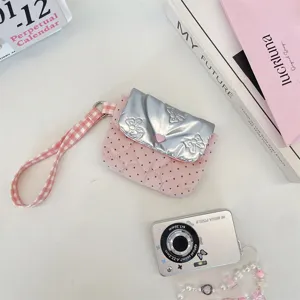 Rosa gesteppte kleine Handgelenktasche mit metallischem Deckel und Schleifendesign, süß