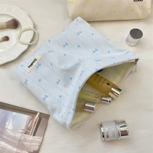 Koreanischer Stil süße Schleife Stickerei Kosmetiktasche, tragbare Reise Make-up Aufbewahrung.