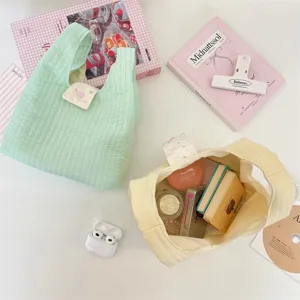Bolso de mano acolchado de algodón suave, bolso de muñeca casual para mujeres.
