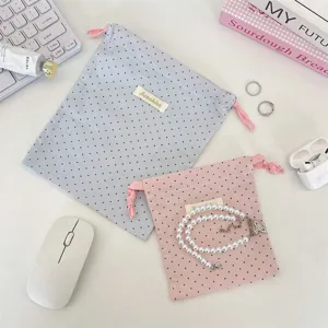 Süßer gepunkteter Kordelzug-Aufbewahrungsbeutel für Schreibwaren, tragbare Stofftasche.