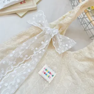 Beige lace embroidered tote bag with ribbon bow, fresh casual single shoulder canvas bag.