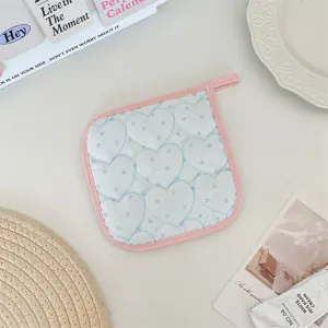 Korean style quilted pot holder with blue heart pattern, cute pink edge trim and hanging loop.