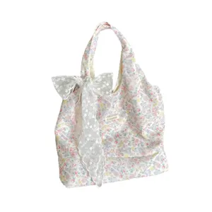 Zoete bloemige canvas tote tas met witte kanten strik detail, casual schoudertas