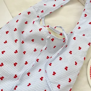 Blue and white gingham cherry print tote bag with cute bow straps for daily casual use.