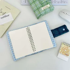 Green and blue plaid fabric notebook cover and stationery storage pouch set for daily use.