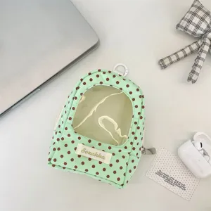 Mint green polka dot doll storage bag with transparent window mini backpack pouch zipper