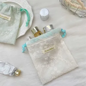 Pochette cordon en tulle brodé de fleurs, sac portable pour bijoux et rangement cosmétique.