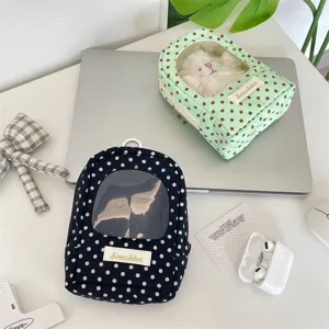 Cute polka dot doll storage bag with transparent display window and zipper closure for daily use.