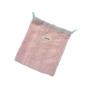 Rosa Spitzen-Stoffaufbewahrungstasche mit Kordelzug, tragbarer Kosmetik-Organizer.