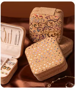 Portable cork jewelry box travel organizer for rings, earrings and small accessories.