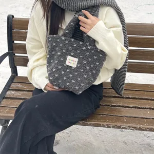 Winter fuzzy plush handbag for women, cute dark gray tote bag with soft fabric and top handle.