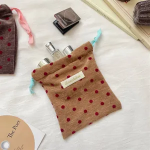 Portable velvet polka dot drawstring makeup bag with contrast cord travel jewelry pouch