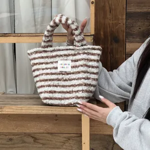 Cozy brown and white striped plush handbag, cute winter fluffy tote bag for women and daily use.
