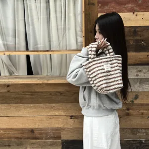 Cute winter plush handbag for women, brown and white striped furry tote bag for daily use.