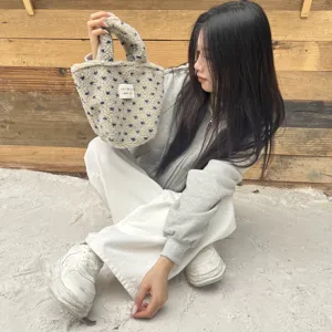Fluffy plush handbag detail view, cute Korean style small winter tote bag for women daily use.