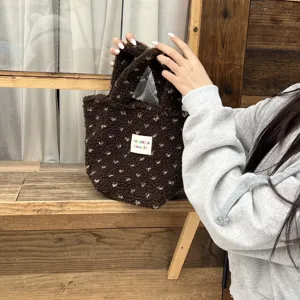 Cute winter fuzzy plush handbag for women, stylish casual small tote bag for daily use.