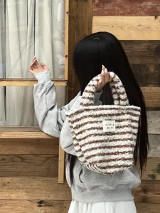 Cute korean style fuzzy striped handbag for women, soft plush winter small tote bag.