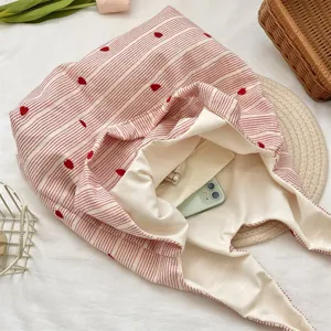 Cute striped tote bag with red heart embroidery, stylish large capacity bag for students daily use.