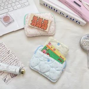 Cute quilted card holder with snap closure and multi-compartment for daily small items.