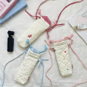 Korean style quilted camera bag with cute heart embroidery and plaid drawstring strap.