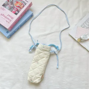 Korean girlish quilted camera bag with blue checkered strap and cute embroidered bows.