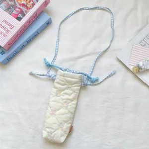 Korean style quilted camera bag with cute embroidery and blue gingham strap for women.