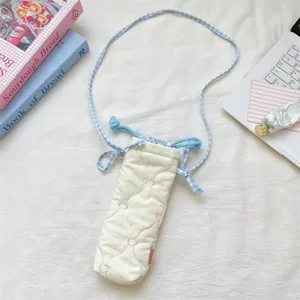 Korean style quilted camera bag with sweet embroidered hearts and blue plaid strap details.