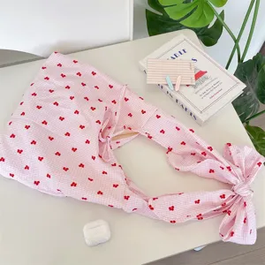 Pink gingham shoulder bag with cute bow strap, casual aesthetic hobo bag for daily travel use.
